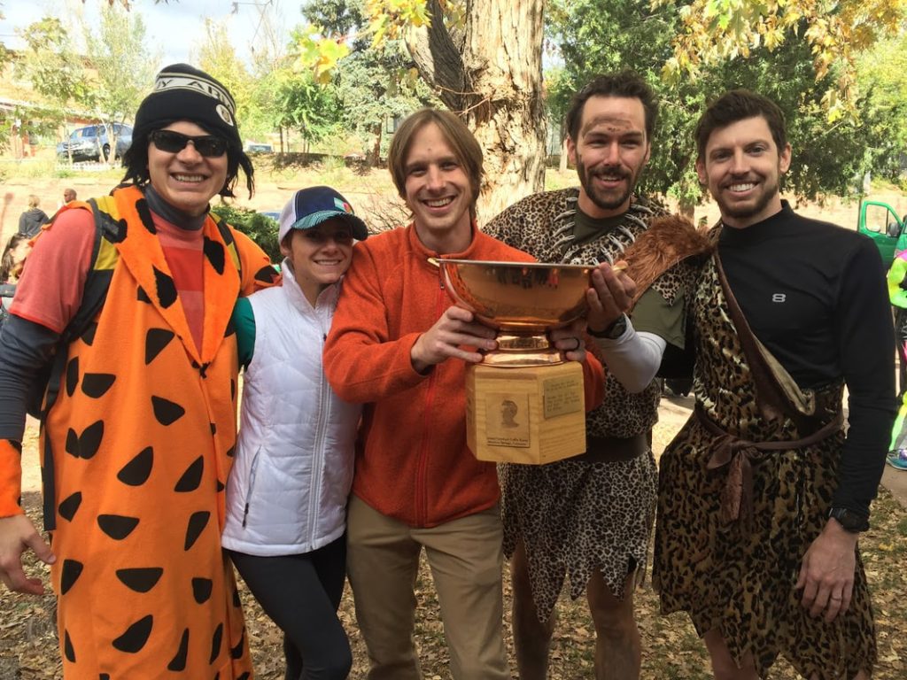 team holding the coffin cup